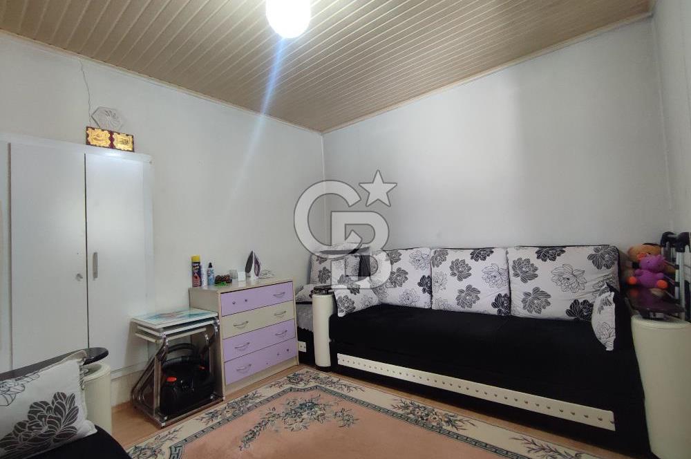 Ayvalık Mutluköy'de Satılık müştemilatlı müstakil ev ve arsa