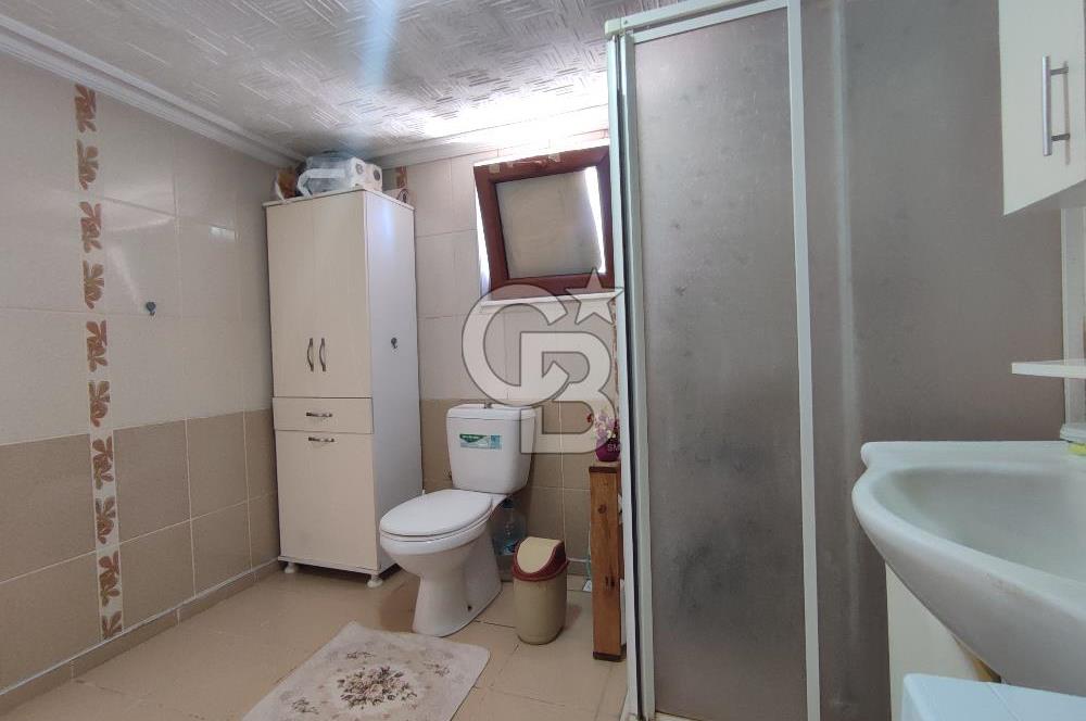 Ayvalık Mutluköy'de Satılık müştemilatlı müstakil ev ve arsa