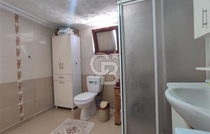 Ayvalık Mutluköy'de Satılık müştemilatlı müstakil ev ve arsa