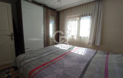 Ayvalık Mutluköy'de Satılık müştemilatlı müstakil ev ve arsa