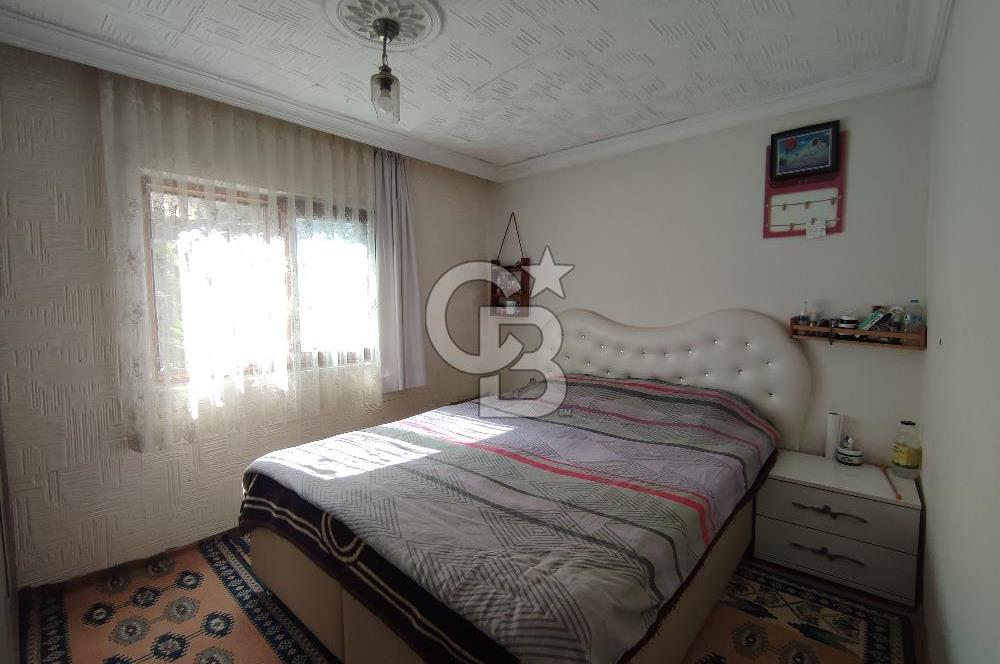 Ayvalık Mutluköy'de Satılık müştemilatlı müstakil ev ve arsa