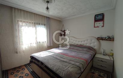 Ayvalık Mutluköy'de Satılık müştemilatlı müstakil ev ve arsa