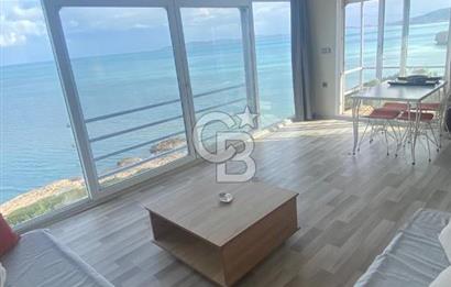 Karaburun Boyabağı'nda Denize Sıfır 2+1 Eşyalı Daire