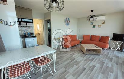 Karaburun Boyabağı'nda Denize Sıfır 2+1 Eşyalı Daire