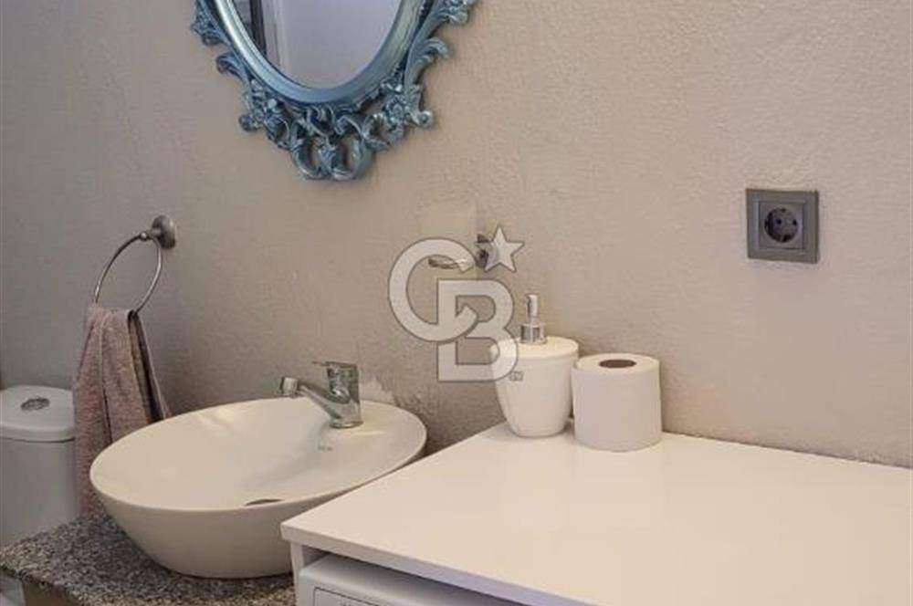 Karaburun Boyabağı'nda Denize Sıfır 2+1 Eşyalı Daire