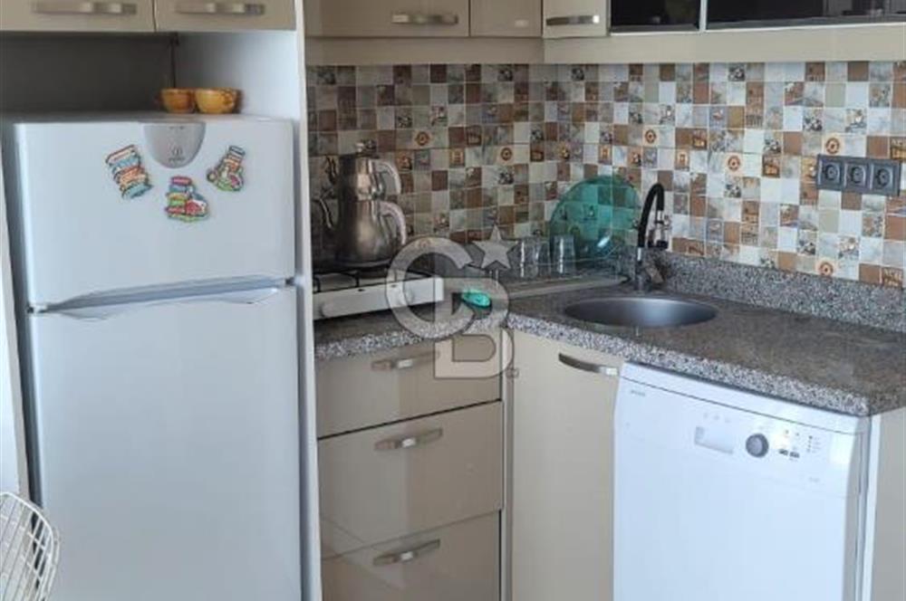 Karaburun Boyabağı'nda Denize Sıfır 2+1 Eşyalı Daire