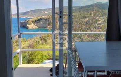 Karaburun Boyabağı'nda Denize Sıfır 2+1 Eşyalı Daire