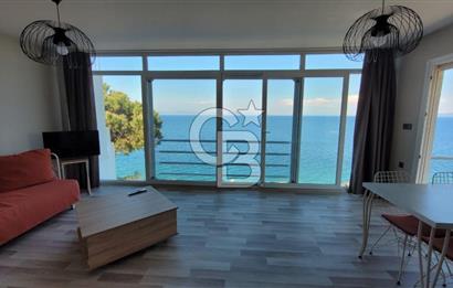 Karaburun Boyabağı'nda Denize Sıfır 2+1 Eşyalı Daire