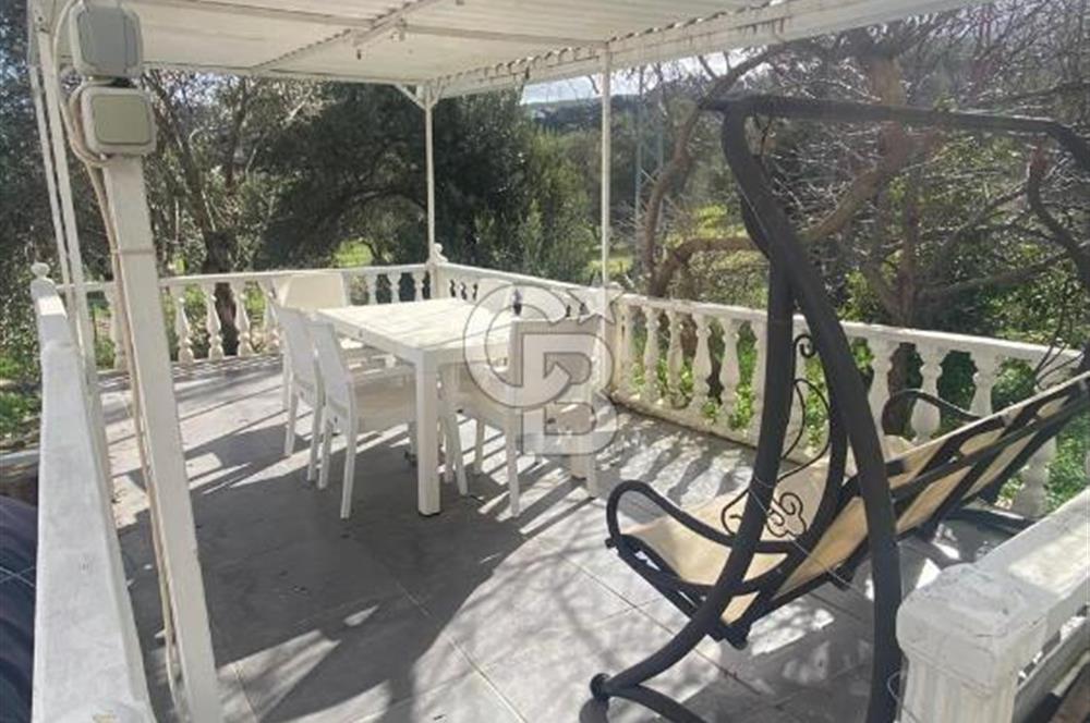 Karaburun Boyabağı'nda Denize Sıfır 2+1 Eşyalı Daire