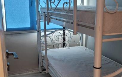 Karaburun Boyabağı'nda Denize Sıfır 2+1 Eşyalı Daire