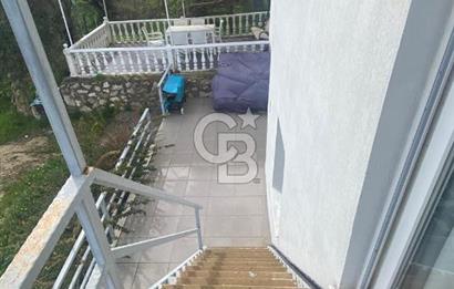Karaburun Boyabağı'nda Denize Sıfır 2+1 Eşyalı Daire