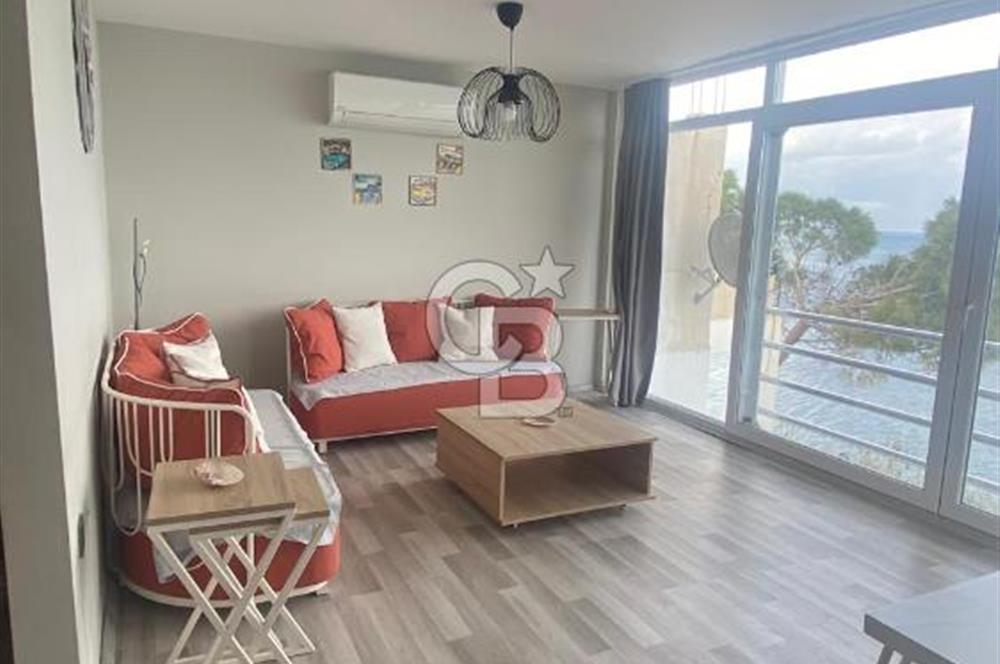Karaburun Boyabağı'nda Denize Sıfır 2+1 Eşyalı Daire