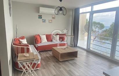 Karaburun Boyabağı'nda Denize Sıfır 2+1 Eşyalı Daire