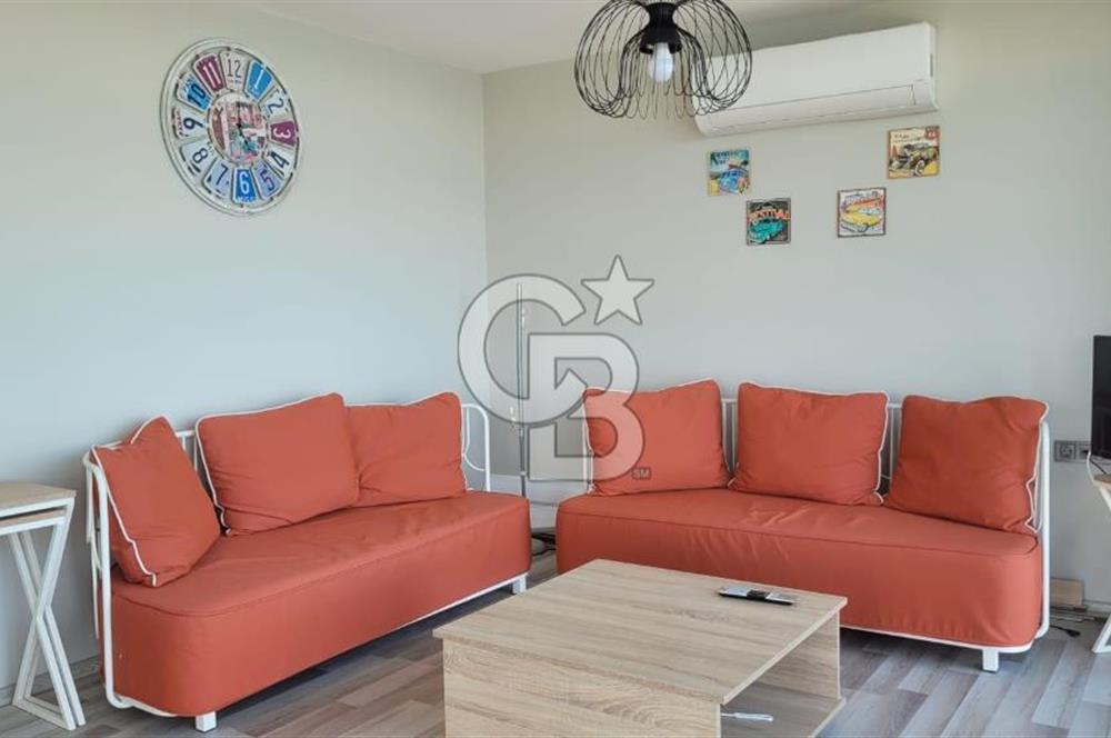 Karaburun Boyabağı'nda Denize Sıfır 2+1 Eşyalı Daire