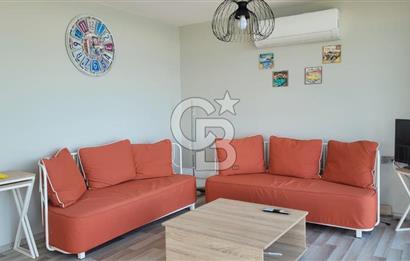 Karaburun Boyabağı'nda Denize Sıfır 2+1 Eşyalı Daire
