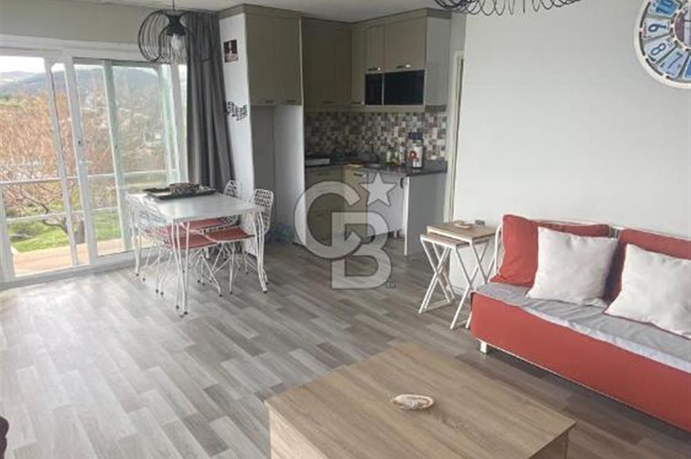 Karaburun Boyabağı'nda Denize Sıfır 2+1 Eşyalı Daire