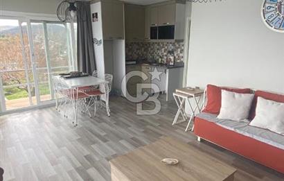 Karaburun Boyabağı'nda Denize Sıfır 2+1 Eşyalı Daire