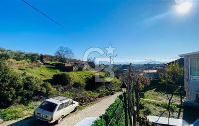 TORBALI HELVACI KÖY MERKEZİNDE MÜSTAKİL TAPULU EV VE ARSASI