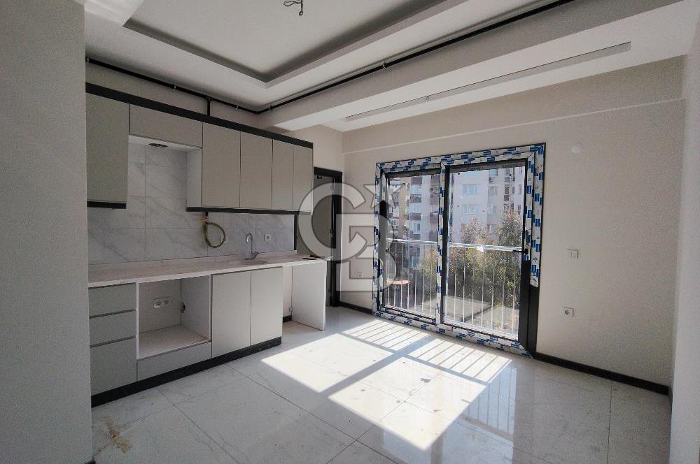 BORNOVA ÖZKANLAR'DA KİRALIK SIFIR 2+1 DAİRE