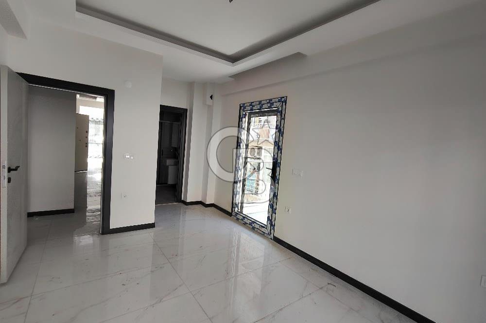 BORNOVA ÖZKANLAR'DA KİRALIK SIFIR 2+1 DAİRE