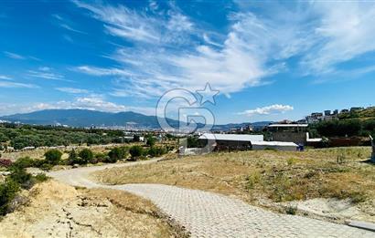 BORNOVA HOMEROS VADİSİNDE GÖLE KOMŞU SATILIK ARSA