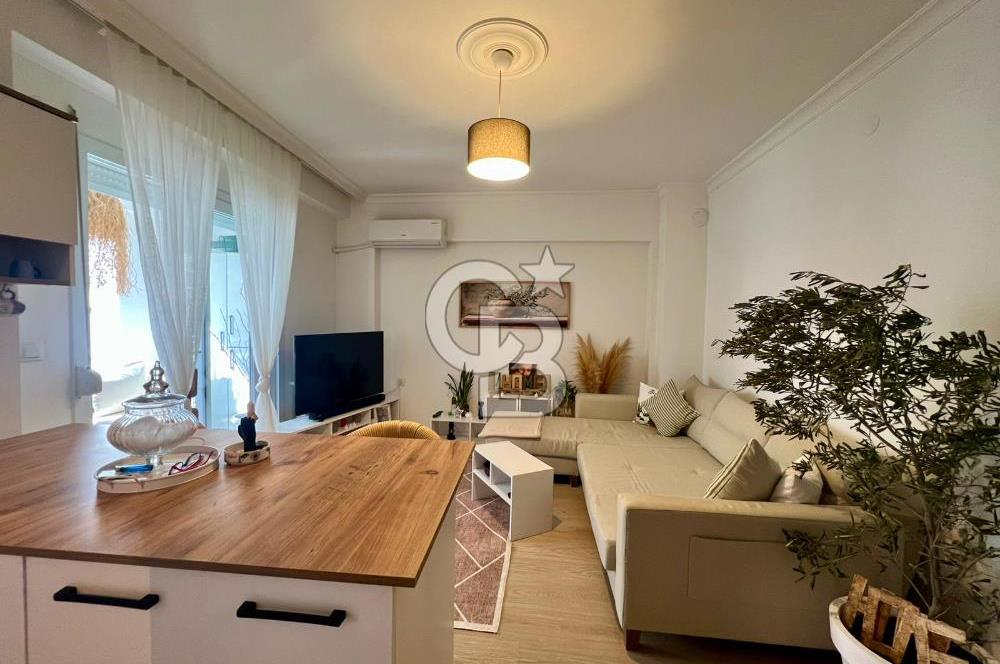 Karşıyaka Şemikler Mahallesi'nde Tadilatlı 2+1 Satılık Daire