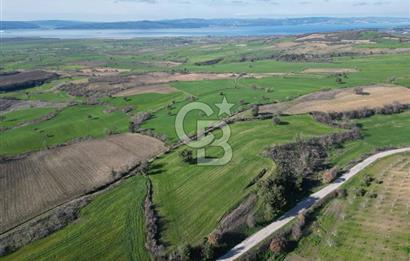 ÇANAKKALE KEMEL KÖYÜNDE BOĞAZ MANZARALI SATILIK 12 DÖNÜM TARLA