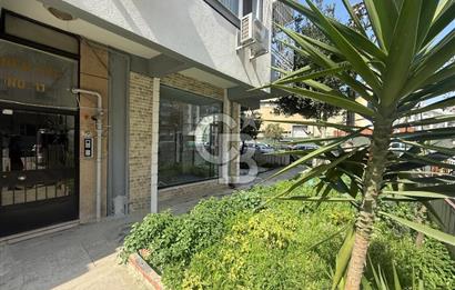 KARŞIYAKA BAHÇELİEVLER’DE KÖŞE KONUMLU, BAHÇELİ SATILIK DÜKKAN