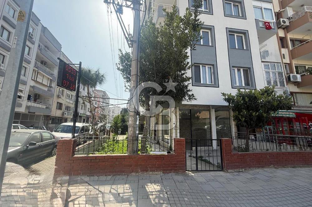 KARŞIYAKA BAHÇELİEVLER’DE KÖŞE KONUMLU, BAHÇELİ SATILIK DÜKKAN