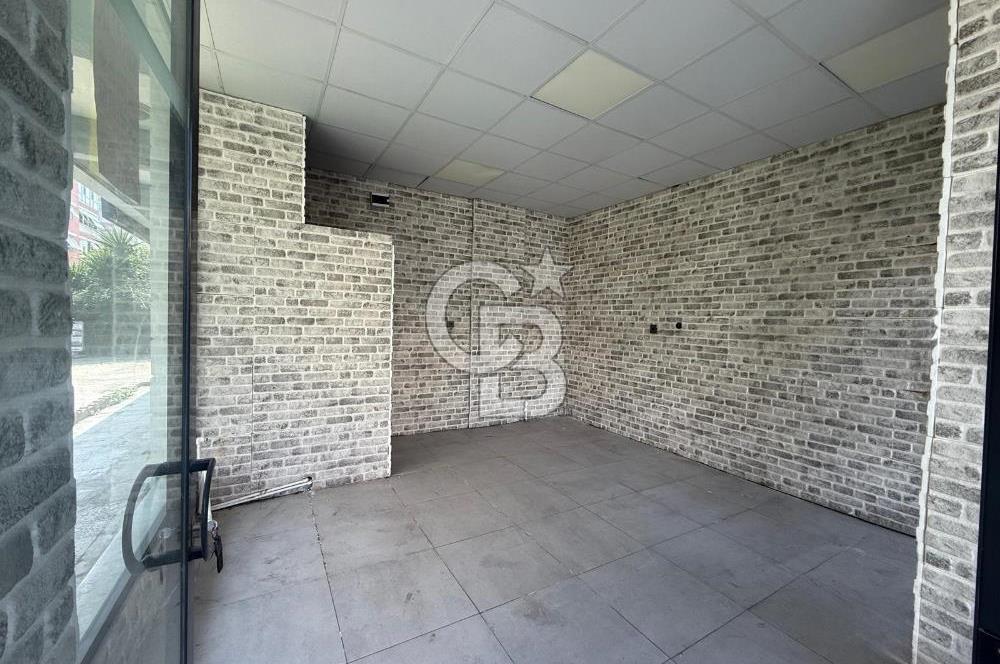 KARŞIYAKA BAHÇELİEVLER’DE KÖŞE KONUMLU, BAHÇELİ SATILIK DÜKKAN