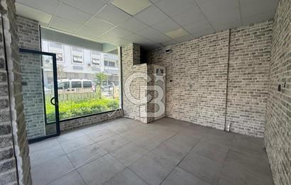 KARŞIYAKA BAHÇELİEVLER’DE KÖŞE KONUMLU, BAHÇELİ SATILIK DÜKKAN