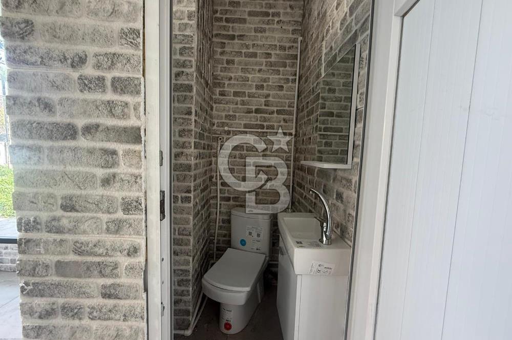 KARŞIYAKA BAHÇELİEVLER’DE KÖŞE KONUMLU, BAHÇELİ SATILIK DÜKKAN