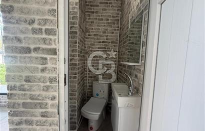 KARŞIYAKA BAHÇELİEVLER’DE KÖŞE KONUMLU, BAHÇELİ SATILIK DÜKKAN