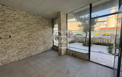 KARŞIYAKA BAHÇELİEVLER’DE KÖŞE KONUMLU, BAHÇELİ SATILIK DÜKKAN