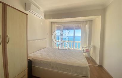 KIYIKIŞLACIK TA DENİZ MANZARALI GÜLÜMKIYI SİTESİNDE PLAJLI 3+1 BAHÇELİ TRİPLEKS VİLLA