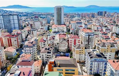 Geniş bahçeli merkezi konumda kiralık bina