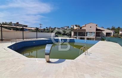 Didim Akbük'te Havuzlu Sitede Kiralık 2+1 Çatı Dubleksi