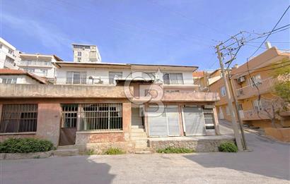 Bayraklı Alpaslan Mahallesinde Deniz Manzaralı Satılık Bina