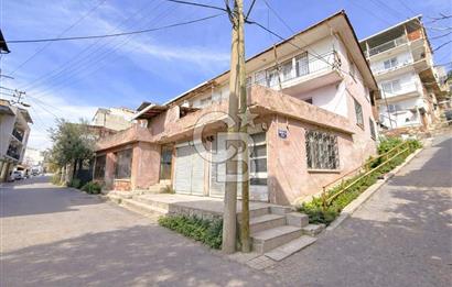 Bayraklı Alpaslan Mahallesinde Deniz Manzaralı Satılık Bina