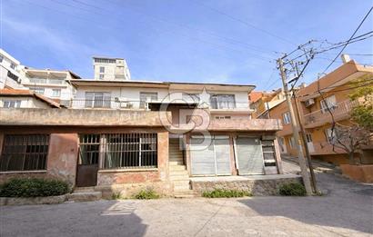 Bayraklı Alpaslan Mahallesinde Deniz Manzaralı Satılık Bina