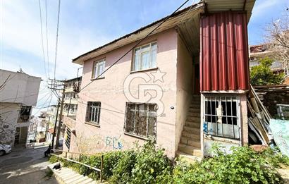 Bayraklı Alpaslan Mahallesinde Deniz Manzaralı Satılık Bina