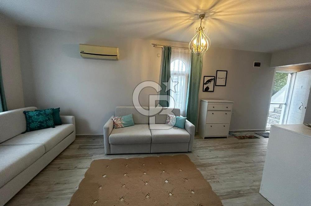 FOÇA FOTAŞ TATİLKÖYÜNDE MUHTEŞEM LOKASYONDA KİRALIK 1+1 DAİRE