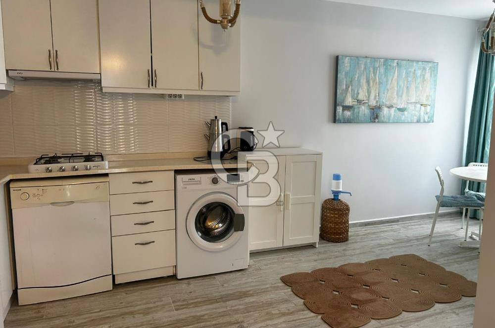 FOÇA FOTAŞ TATİLKÖYÜNDE MUHTEŞEM LOKASYONDA KİRALIK 1+1 DAİRE