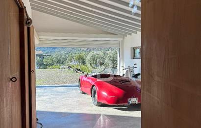 Datça Kızlan'da Satılık Özel Tasarım Havuzlu Taş Mimarili Villa