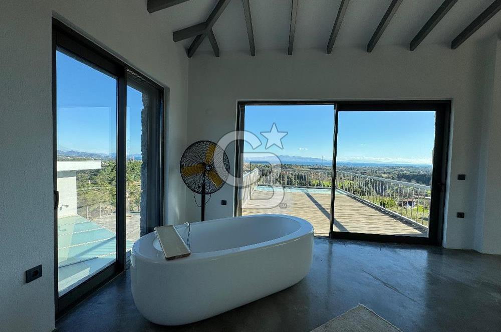 Datça Kızlan'da Satılık Özel Tasarım Havuzlu Taş Mimarili Villa