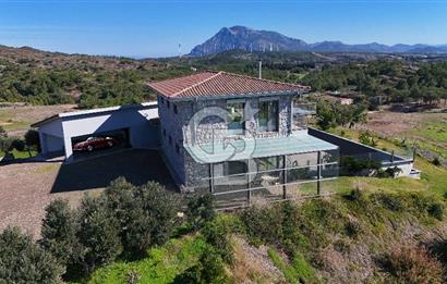 Datça Kızlan'da Satılık Özel Tasarım Havuzlu Taş Mimarili Villa