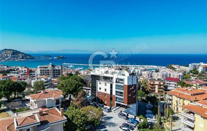 Kuşadası Marina’da 140 m² 2+1 Köşe Bahçe Katı Daire | Eşyalı | Kapalı Mutfak | Havuzlu Site