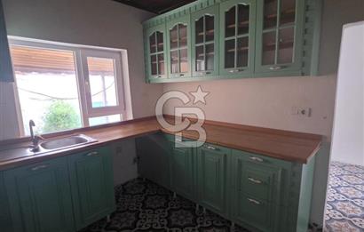 BURHANİYE'DE DOĞA İLE İÇ İÇE MÜSTAKİL BAHÇELİ SATILIK KÖY EVİ