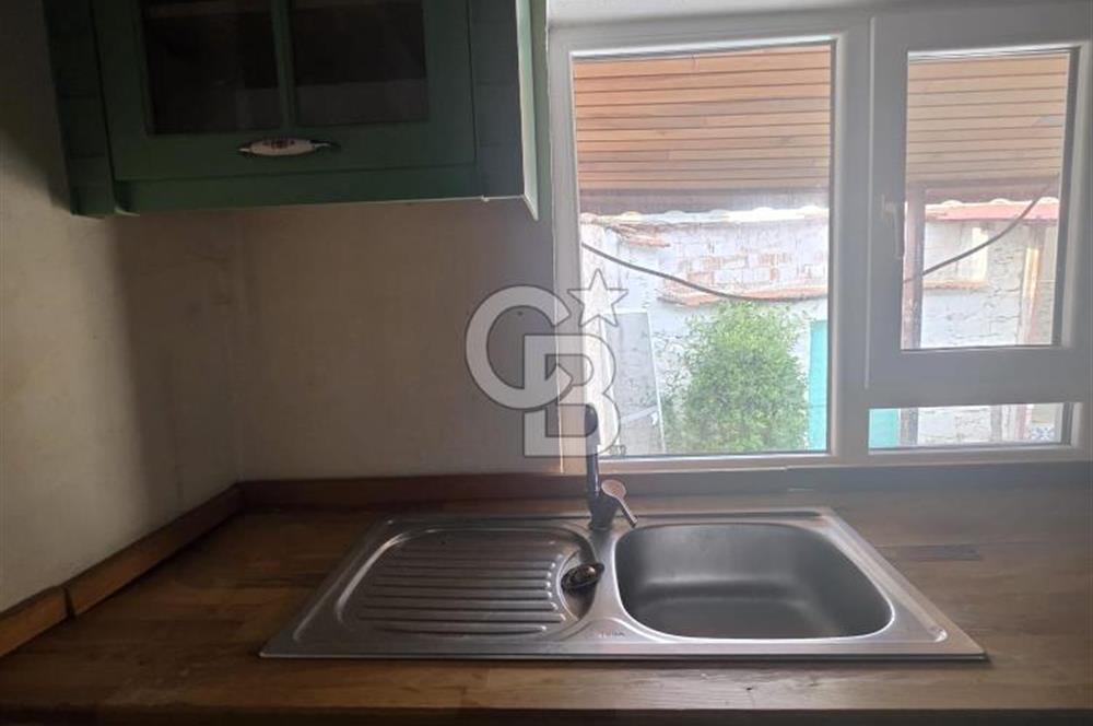 BURHANİYE'DE DOĞA İLE İÇ İÇE MÜSTAKİL BAHÇELİ SATILIK KÖY EVİ