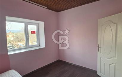 BURHANİYE'DE DOĞA İLE İÇ İÇE MÜSTAKİL BAHÇELİ SATILIK KÖY EVİ